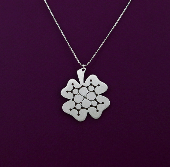 Chlorophyll molecule in a clover necklace in silver by Delftia Science Jewelry