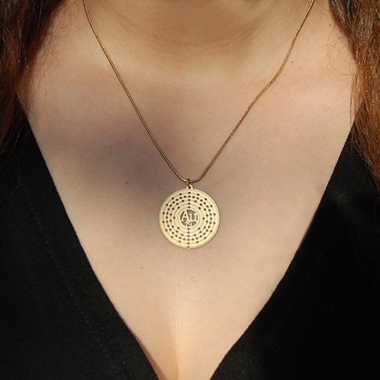 Gold atomic structure necklace by Delftia Science Jewelry