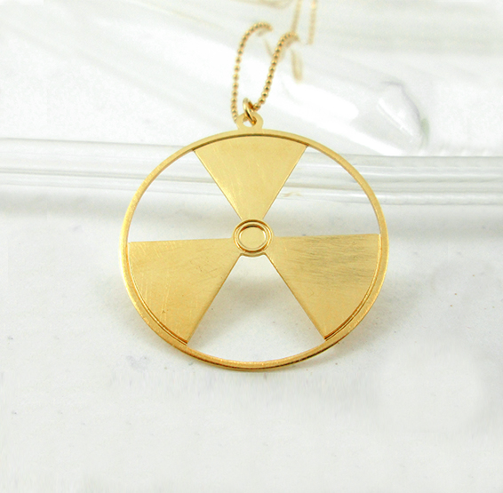 Radiation symbol gold necklace by Delftia science jewelry