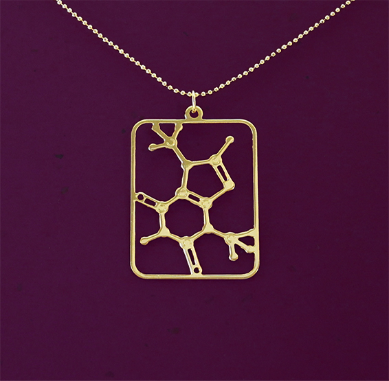 Theobromine molecule necklace in gold by Delftia Science Jewelry