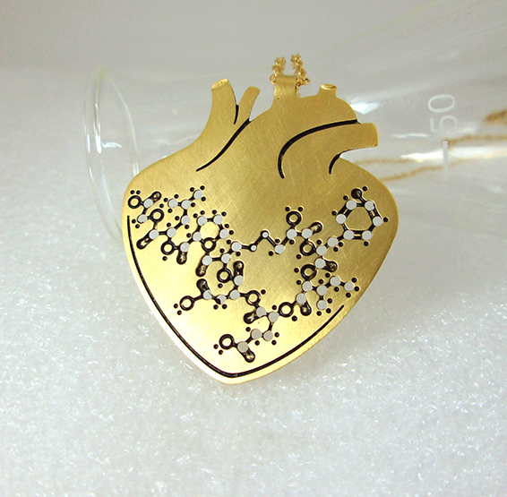 Oxytocin hormone molecule in anatomical gold heart by Delftia science jewelry