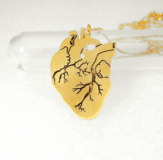 Anatomical heart in gold