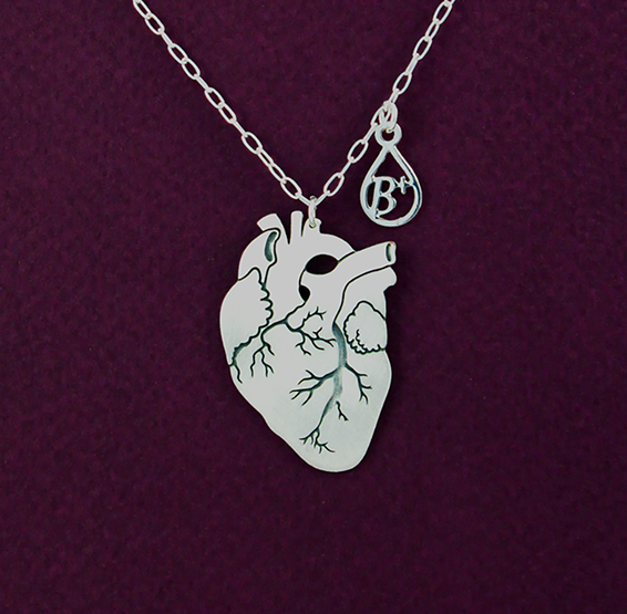 Anatomical heart necklace with silver blood type charm by Delftia science jewelry