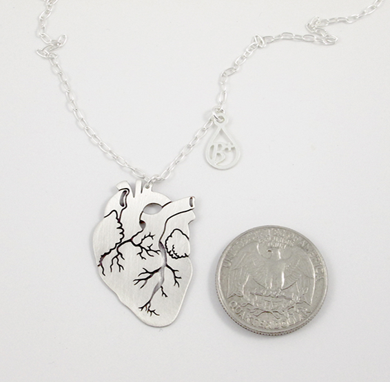 Anatomical silver heart with blood type charm