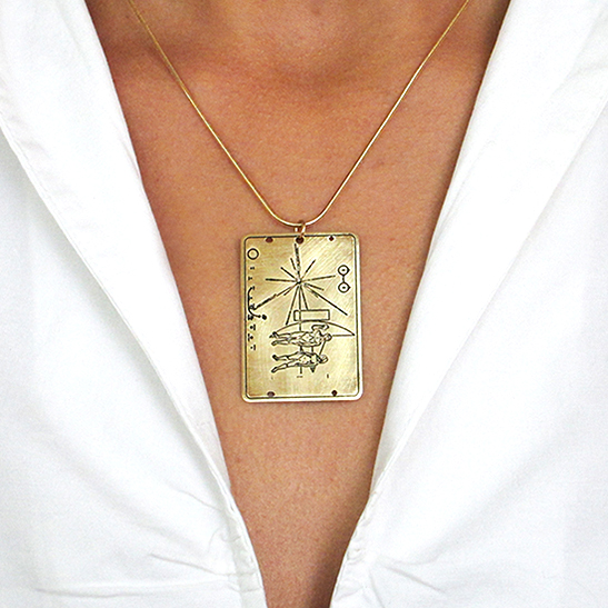 Pioneer plaque gold necklace on a model by Delftia Science Jewelry