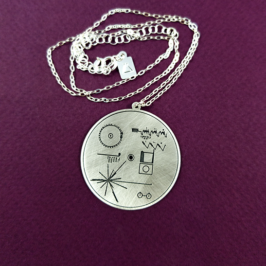 Voyager record pendant by Delftia Science Jewelry