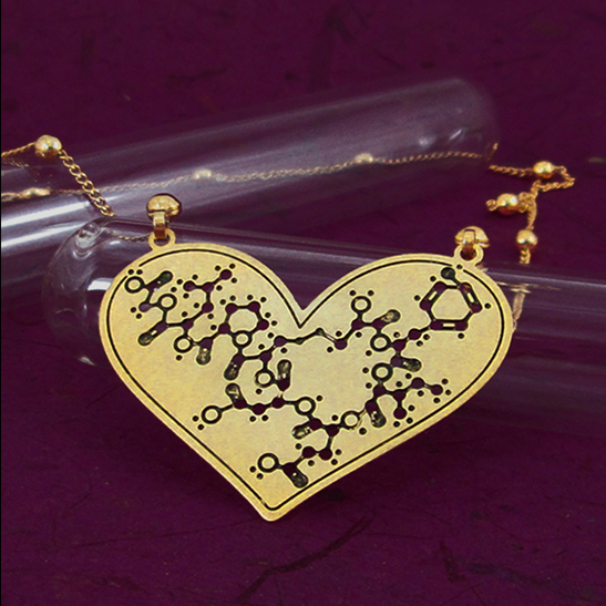 Oxytocin necklace in gold by Delftia Science Jewelry